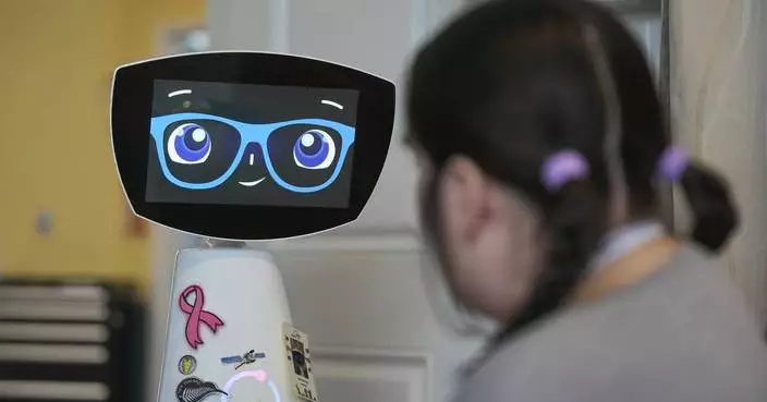 A robot programmed to act like a 7-year-old girl works to combat fear and loneliness in hospitals