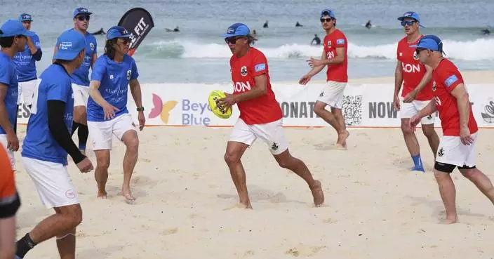 Australian friends claim world record for longest beach touch rugby game