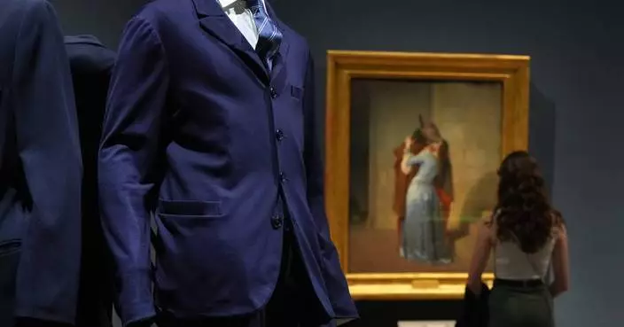 Giorgio Armani’s sartorial creations interplay with Italian masterpieces at Milan museum exhibition