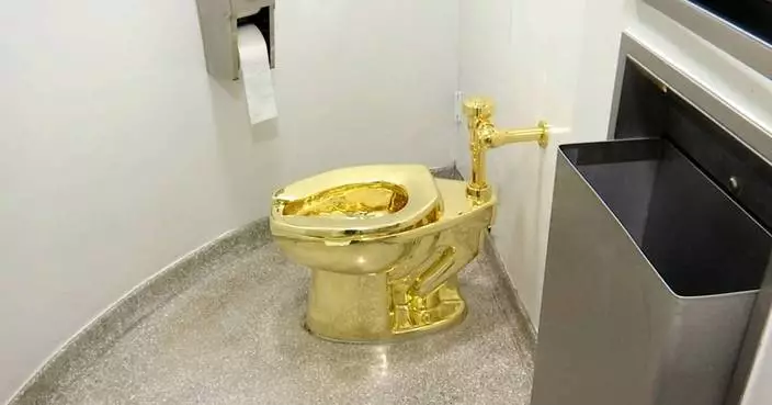 A solid gold toilet is up for auction with a $10 million starting price