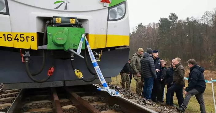 Poland says 2 Ukrainians working for Russia are suspected in railway track blast