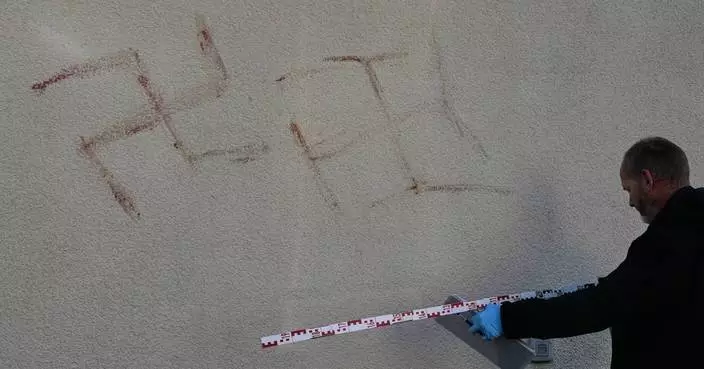 Dozens of swastikas painted in human blood daubed on property across German city