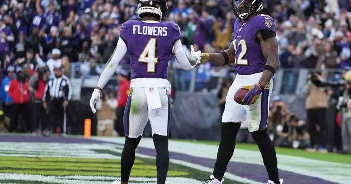 Henry rushes for 2 TDs to help sluggish Ravens to fifth straight win, 23-10 over Jets