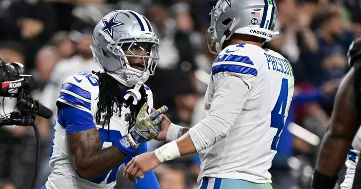 Cowboys honor Kneeland, then get 4 TD passes from Prescott in 33-16 win over Raiders