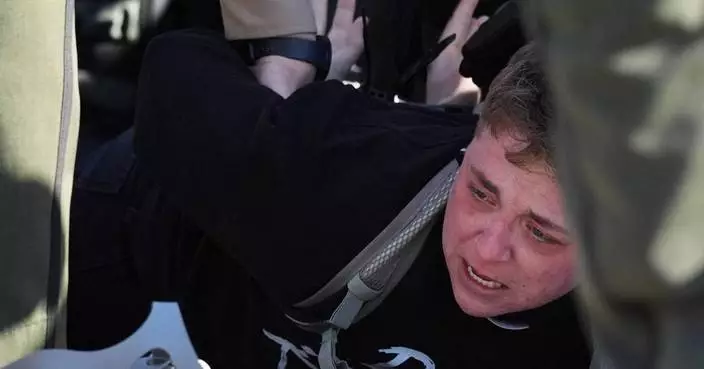 Protesters arrested, officers injured in clash outside Chicago-area immigration facility