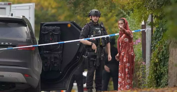 Man arrested on suspicion of involvement in attack at a Manchester synagogue that killed 2
