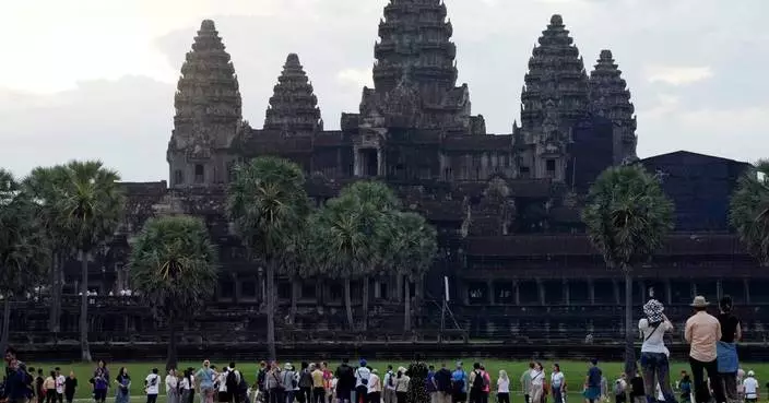 A night bus from Cambodia’s top tourist destination plunges off a bridge, killing 16 passengers