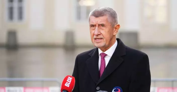 Czech president swears in new coalition government of populist billionaire Andrej Babiš