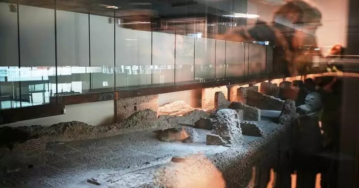 Rome opens long-awaited Colosseum subway station, with displays of unearthed artifacts