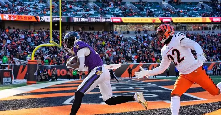 Lamar Jackson's 2 TD passes, long pick-6 propel Ravens to 24-0 win over Bengals