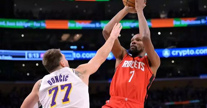 Amen Thompson's 26 points lead Rockets to 119-96 win over Doncic and the Lakers