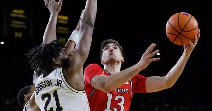 Johnson scores 22 as No. 3 Michigan routs Rutgers 101-60