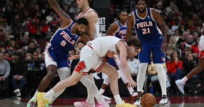 Smith ignites decisive run with thunderous dunk on Embiid as Bulls beat 76ers 109-92