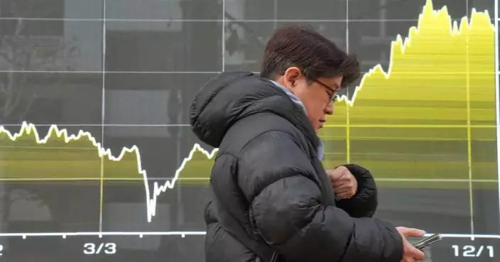 Asian shares advance after Japan raises its key interest rate to its highest level in 30 years