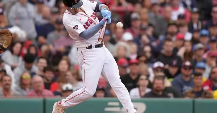 Angels acquire infielder Vaughn Grissom in a trade with the Red Sox