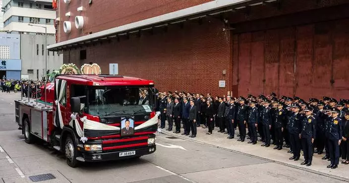 Hong Kong mourns firefighter killed in city's deadliest fire in decades