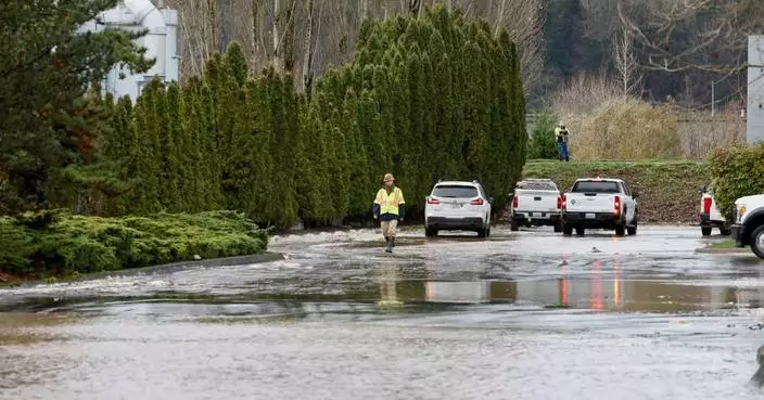 A driver is found dead in a submerged car near Seattle after a week of heavy rain and flooding