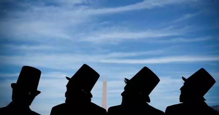 Photos show mock funeral for the penny at Lincoln Memorial