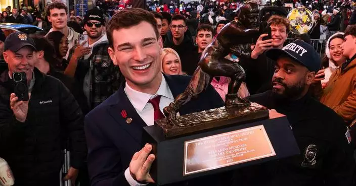 No. 1 Indiana gives offensive coordinator Mike Shanahan a 3-year contract extension, AP source says