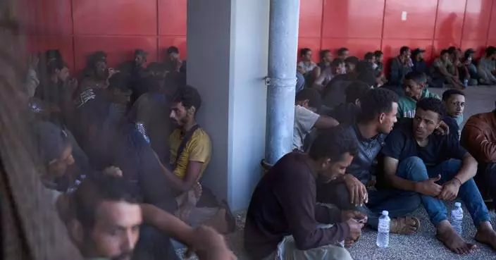 2 survivors found among bodies on a migrant boat south of Crete say 15 others are missing