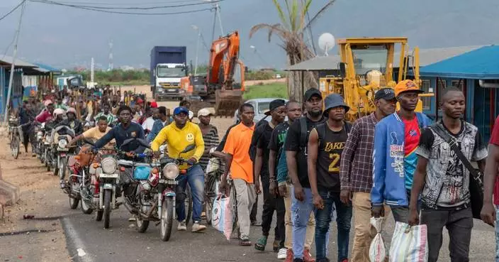 Rwanda-backed M23 rebels say they will withdraw from seized city in eastern Congo