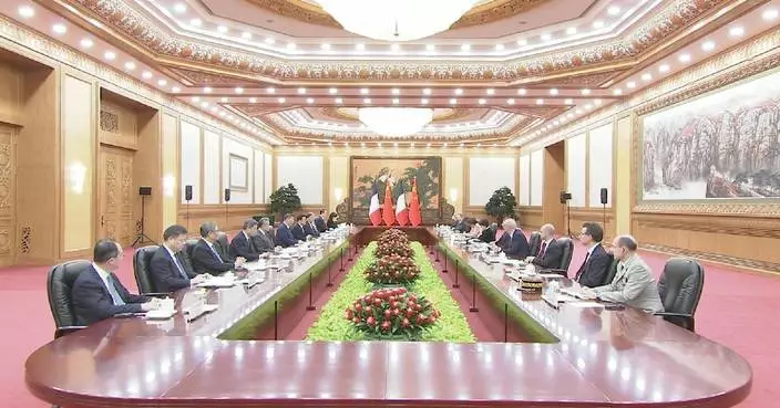 Xi holds talks with Macron, calling for expanded cooperation in multiple areas