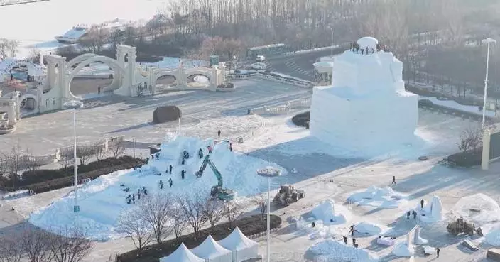Construction of 23.8-meter-high snowman begins in start of snow sculpture expo in northeast China's Harbin