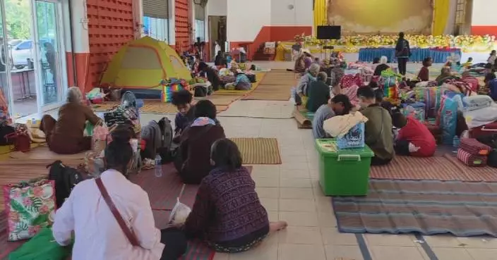 Residents affected by Thai-Cambodian conflict stream into temporary shelters