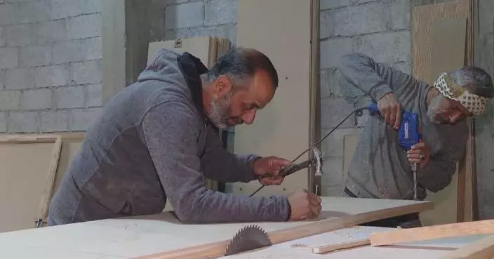 Carpenters in war-torn Syrian town revive craft despite challenges