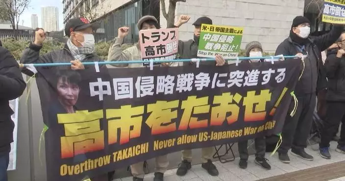 Japanese rally against PM, military buildup