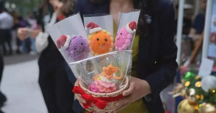 Holiday fair in Hong Kong raises support for families after Tai Po tragedy