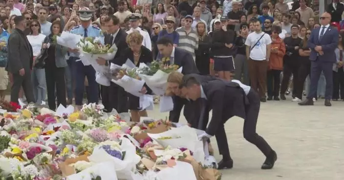 Australia mourns victims of Bondi Beach shooting with flags at half-mast