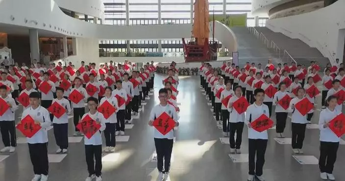 GBA students celebrate 26th anniversary of Macao’s return to motherland with traditional calligraphy art