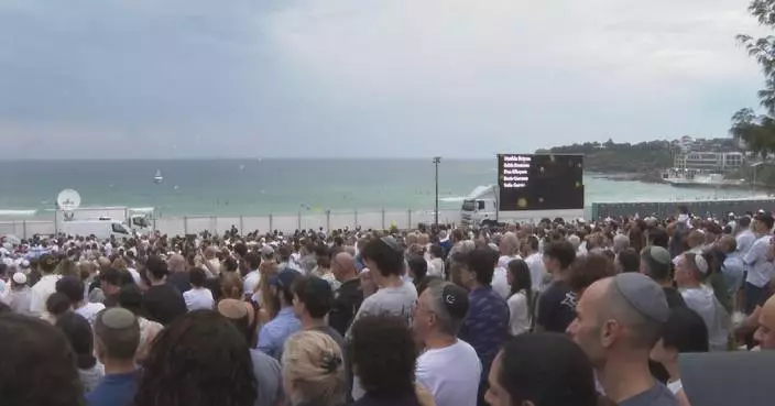 Thousands gather at Sydney’s Bondi Beach to mark one week after fatal mass shooting