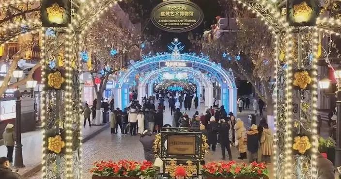 China’s winter tourism booms with light shows, ice, hot springs