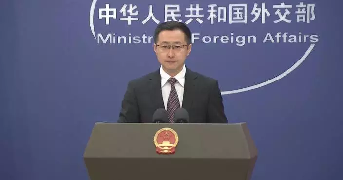 China criticizes Japan's record defense budget plan