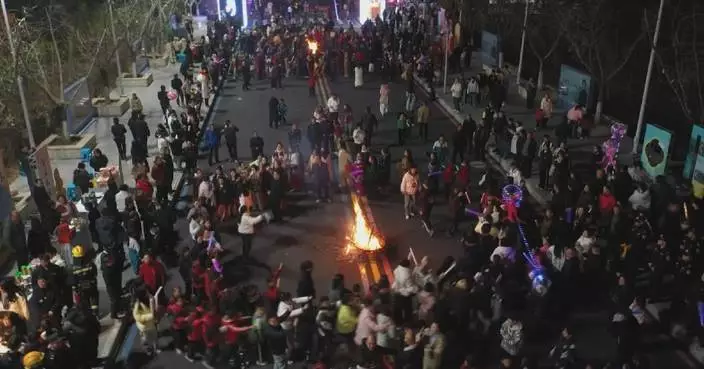 Folk art parade in Guizhou county greets 2026