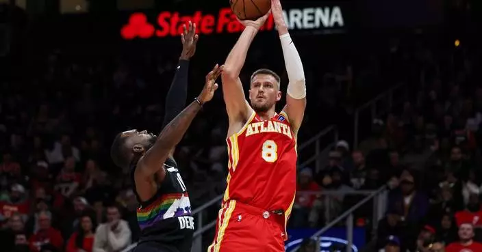 Kristaps Porzingis to miss two weeks with illness, Trae Young nears return