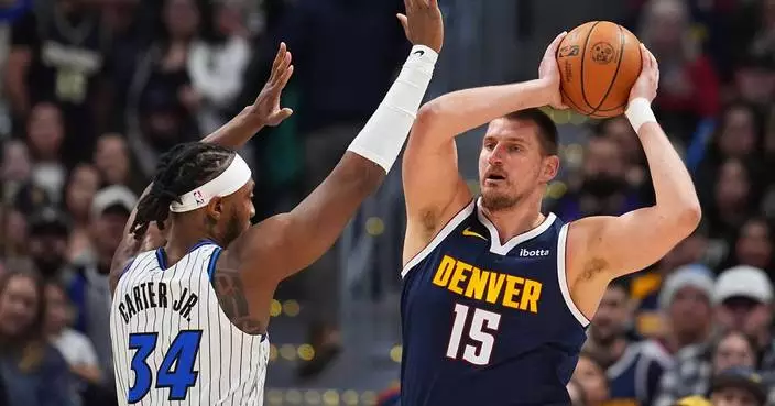 Jokic sets the career record for assists by a center as the Nuggets beat the Magic 126-115