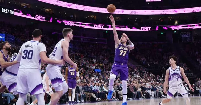 Doncic has 45 points and a triple-double as the Lakers come back to beat the Jazz 143-135