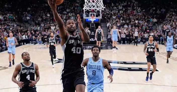 Harrison Barnes scores 31 points as the San Antonio Spurs beat the Memphis Grizzlies 126-119