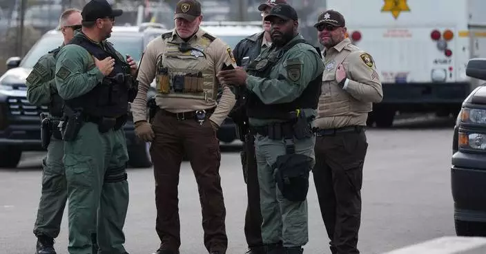 Court blocks the release of hundreds of immigrants arrested in a Chicago-area crackdown