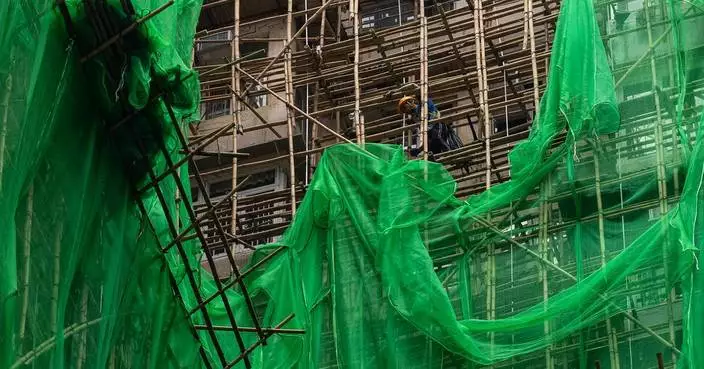 Hong Kong residents and experts defend bamboo scaffolding after deadly fire