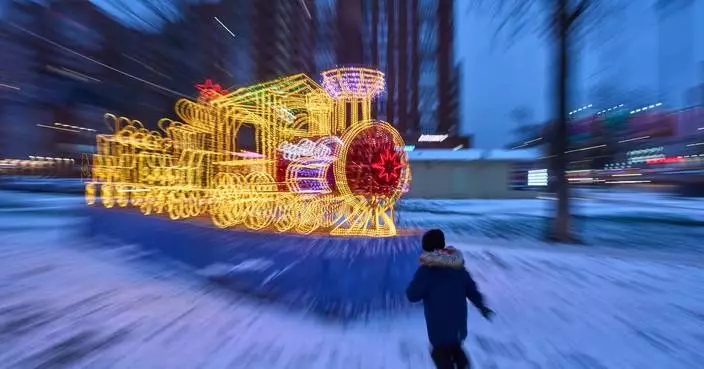 Photos show a world aglow with holiday lights