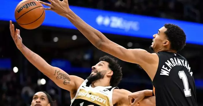 Fox scores 27, leads Spurs to 124-113 win over Wizards