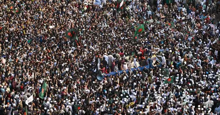 A funeral for slain Bangladeshi activist draws hundreds of thousands