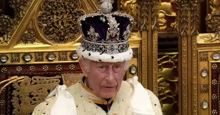 Protesters arrested after smearing custard and crumble on Crown Jewels case at Tower of London