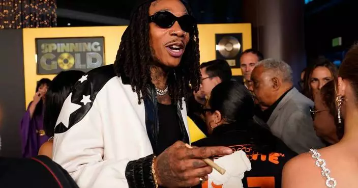 Romanian court sentences US rapper Wiz Khalifa to 9 months for drug possession