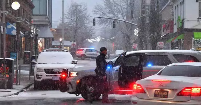 The Latest: A person is in custody after deadly Brown University shooting leaves 2 dead, 9 wounded