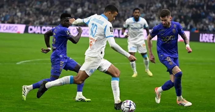 Lens claims Christmas top spot in Ligue 1. Greenwood's late goal helps Marseille beat Monaco